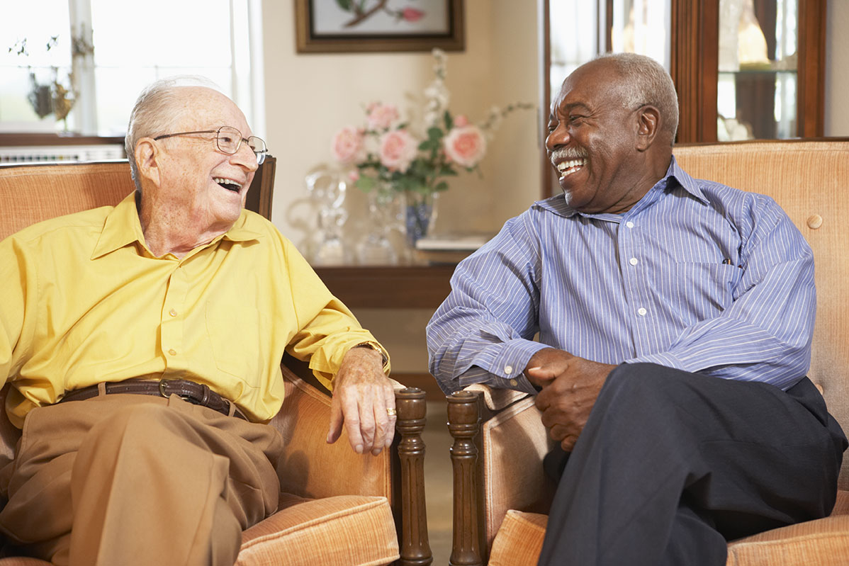 Residents laughing together at Somerset Lodge